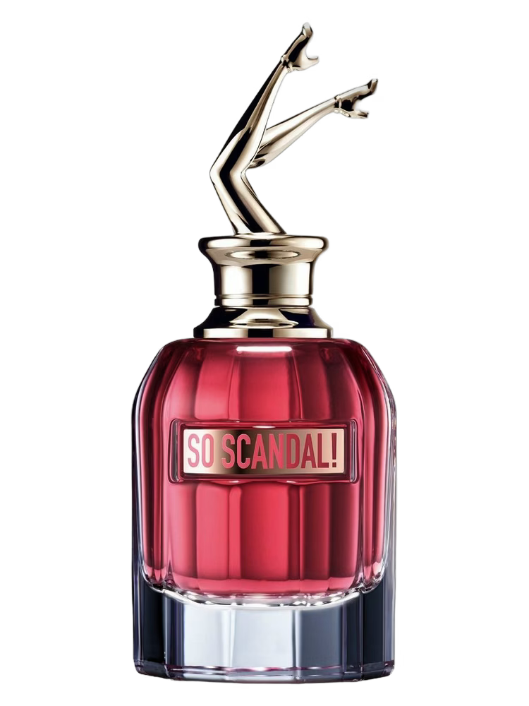 Red perfume bottle with silver nozzle on a black background